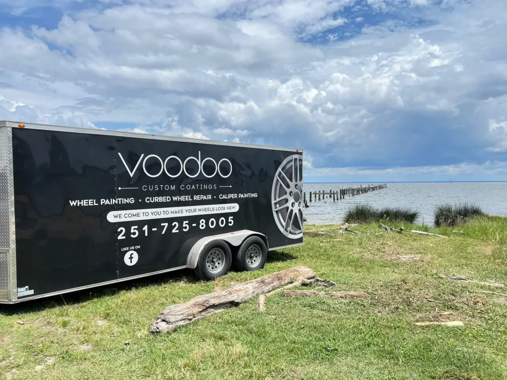 Voodoo Custom Coatings and Wheel Repair's enclosed on-site service trailer on Dauphin Island, Alabama.